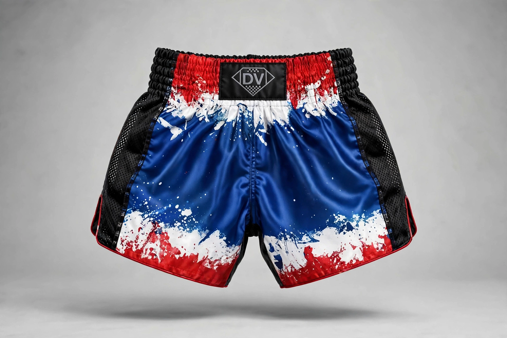 Blue red white Muay Thai shorts Deuka DV logo mesh panels floating studio