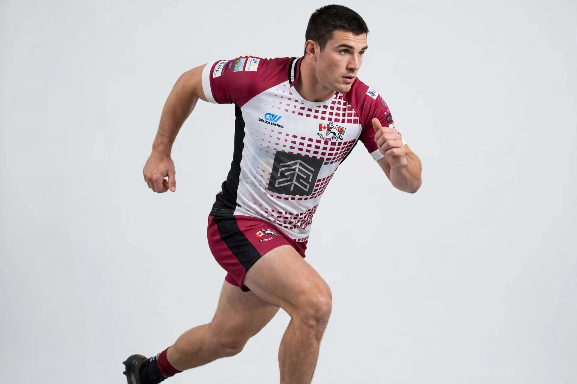 Pro-fit streamlined maroon white rugby kit with body contouring tailored silhouette minimizing loose fabric for maximum agility